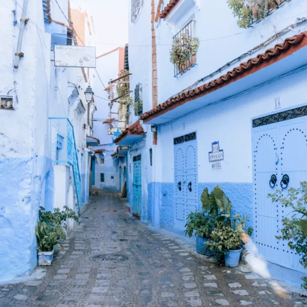 Narrow blue painted alley in the medina of Chefchaouen, Morocco